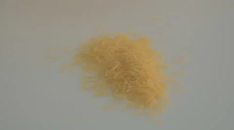 Pile of small vermicelli on a white background Stock Footage 43240328