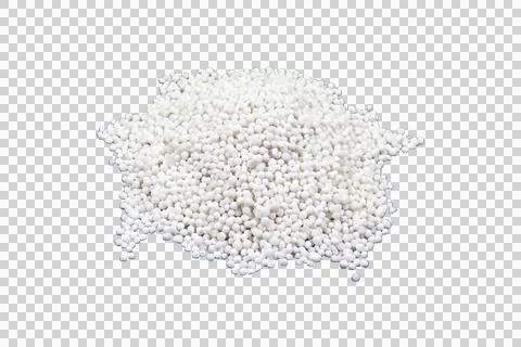 A pile of small white spherical pellets, granular chemical fertilizer or in.. Stock Photos
