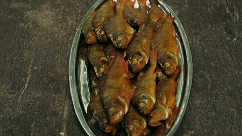 Pile of smoked perch Stock Footage 162115804