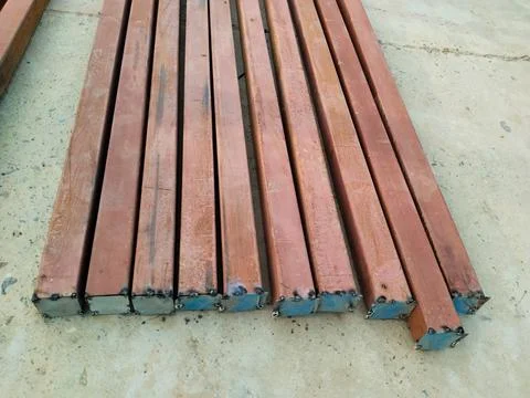 Pile of square rectangle tubes metal iron production profiles Stock Photos