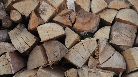 Pile stack of firewood chopped wood stacked up ready for winter Stock Footage 247369712