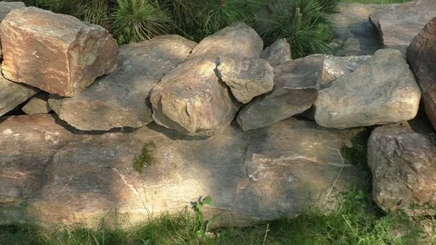Pile of stacked slabs of stone Stock Footage 76652849