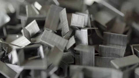 Pile of Staples extreme close up UHD stock footage Stock Footage