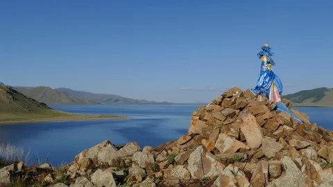 Pile of stones on the background of the lake. Stock Footage 80090399