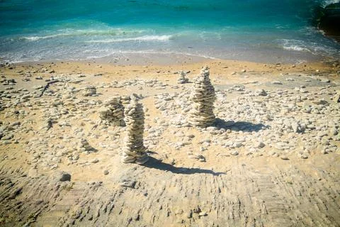 Pile of stones on the beach Stock Photos