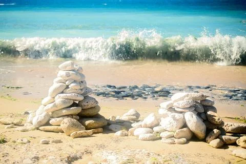 Pile of stones on the beach Stock Photos