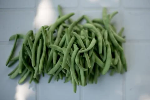 A pile of string beans, bokeh Stock Photos