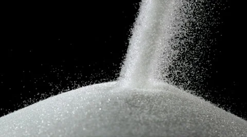 Pile of sugar on black background, Slow Motion Stock Footage 27235789
