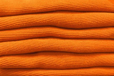 Pile of sweaters Stock Photos