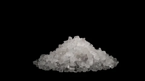 Pile of table salt crystals. Circle shaped. Rotating on the turntable. Isolated Stock Footage 96990135
