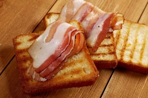 Pile  toasted bread bacon Fotos de archivo