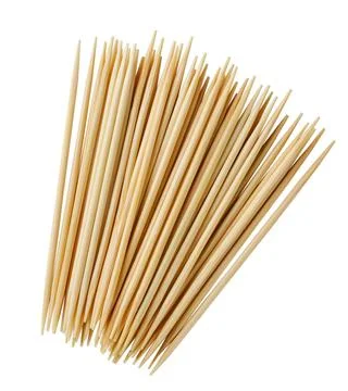 Pile of toothpicks close-up on a white background. Top view Stock Photos