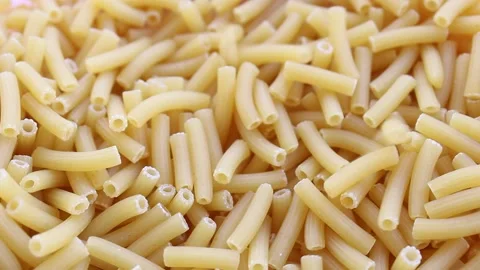 Pile of uncooked pasta, close up view of raw food Stock Footage 159703943