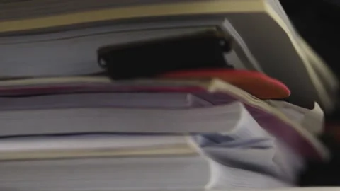 Pile of unorganized document placed on desk. Unfinished work, homework. Stock-Footage 158684874