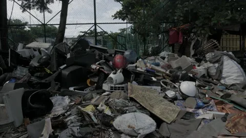 Pile of used electronic and plastic housewares waste Stock Footage 132116123