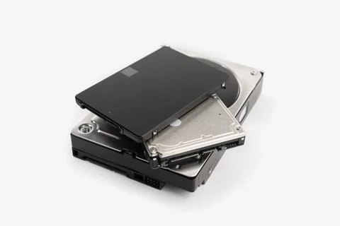 Pile of a variety of computer Hard disk drive HDD and SSD isolated on white Stock Photos