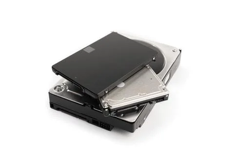 Pile of a variety of computer Hard disk drive HDD and SSD isolated on white Stock Photos