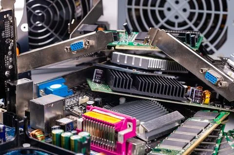 Pile with various computer electrical boards and components, Repairing and .. Foto stock