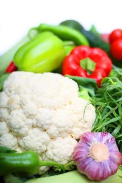 Pile of vegetables on white Stock Photos