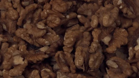 A pile of walnut nuts rotates Stock Footage 105038324