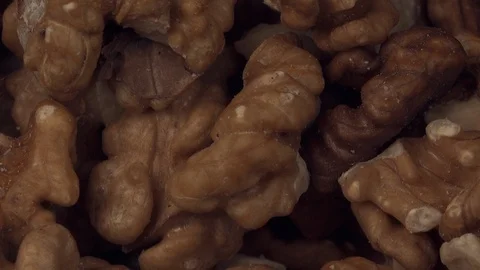 A pile of walnut nuts rotates Stock Footage 105038375