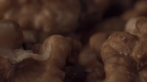 A pile of walnut nuts rotates Stock Footage 105038411