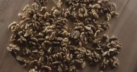 Pile of walnuts on table Stock Footage 146427885