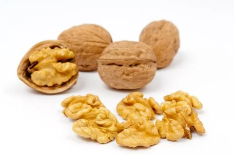 Pile of walnuts on white background Stock Photos