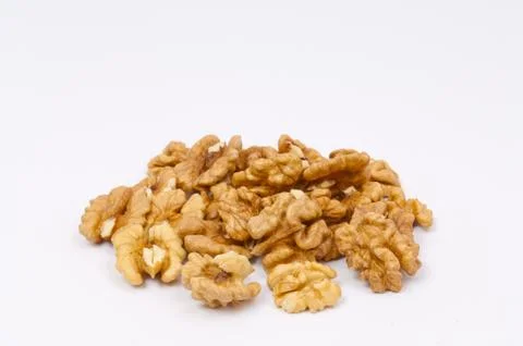 Pile of walnuts on white background Stock Photos
