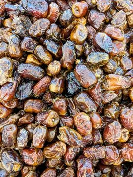 Pile of wet dates macro background close up stock photo 写真素材
