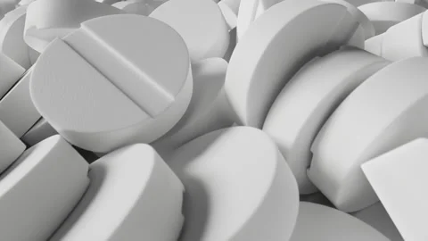 Pile of white pills close up Stock Footage 203889686