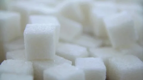 Pile of white refined sugar cubes in macro detail Stock Footage 333836685