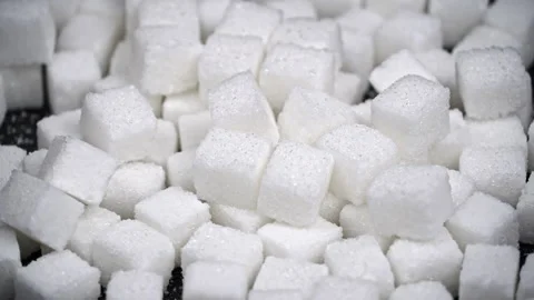 Pile of White Sugar Cubes on a Black Background Stock Footage 263229409
