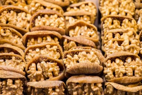 Pile of whole walnuts  without nutshells in fig Stock Photos