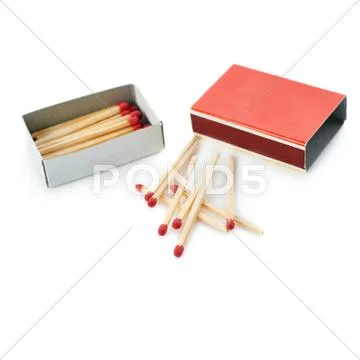 Pile of Wooden matches with box isolated over the white background Stock Photos
