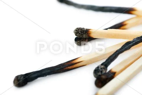 Pile of Wooden matches isolated over the white background Stock Photos
