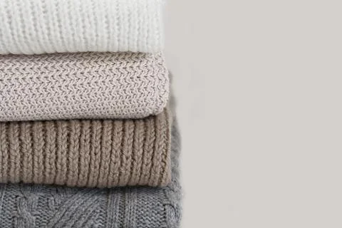 Pile of wool sweaters. Stock Photos