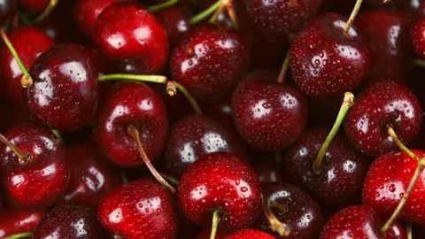 Piled and wet cherries from a top view Stock Footage 132429836