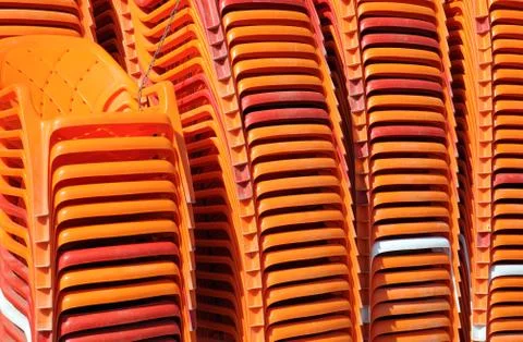 Piled beach chairs Stock Photos