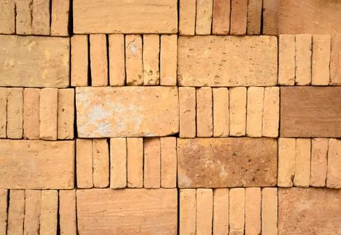 Piled up of brick stack in a construction site Stockfoto's