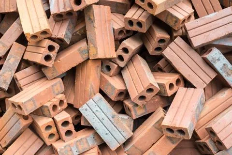 Piled bricks for house construction Stock Photos