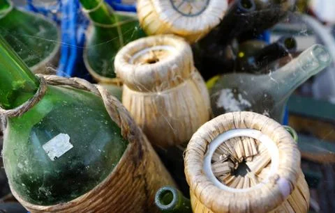 Piled up discarded empty wine bottles Stock Photos