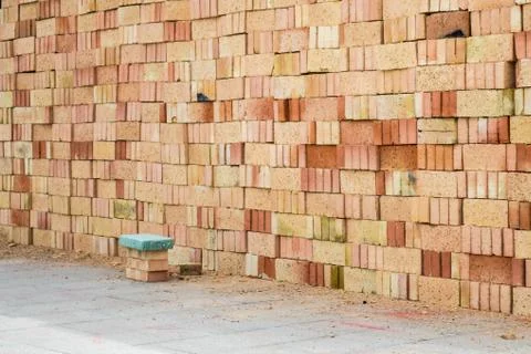 Piles of Bricks in the Construction Site Stock Photos