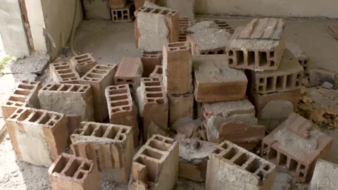 Piles of bricks in unfinished building in Sofia, Bulgaria showing halted Video stock 327394559