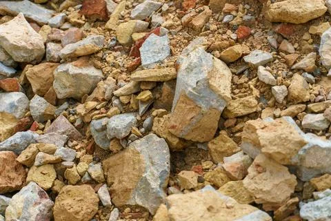 Piles of broken old bricks and other construction debris at the construction  Stock Photos
