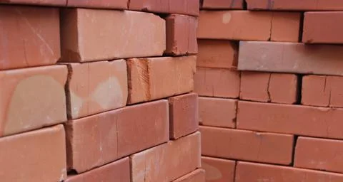 Piles of clay bricks ready for construction Foto stock
