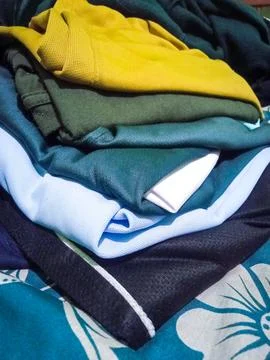 Piles of clothes Stock Photos