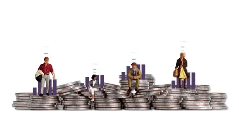 Piles of coins and bar graphs with miniature people. Stock Footage 232229092