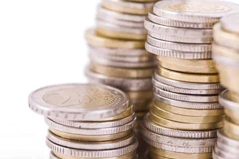Piles of coins Stock Photos