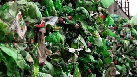 Piles of compressed plastic bottles prepared for recycling Stock Footage 84285031